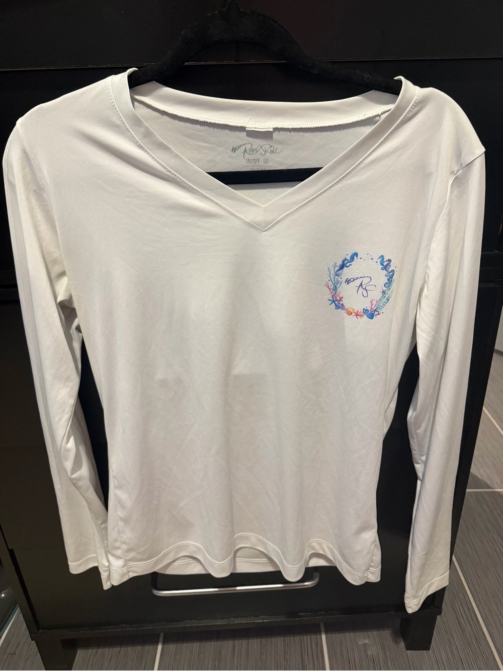 Rae Dunn White V-Neck Long Sleeve Top with Blue-Pink Floral Crest